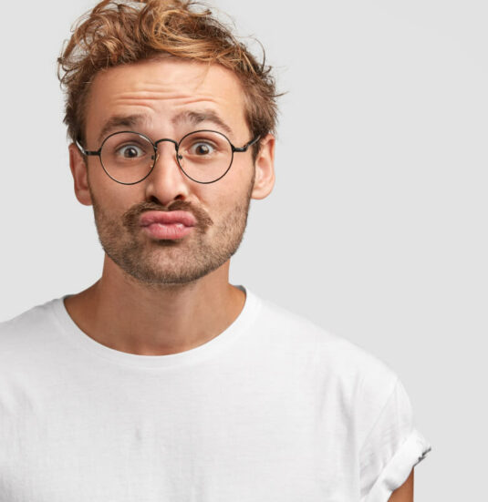 funny-curious-man-makes-grimace-purses-lips-looks-doubtfully-1