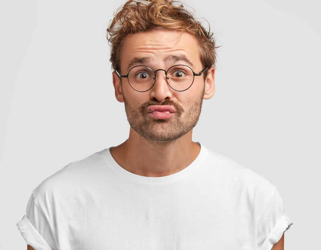 funny-curious-man-makes-grimace-purses-lips-looks-doubtfully-1